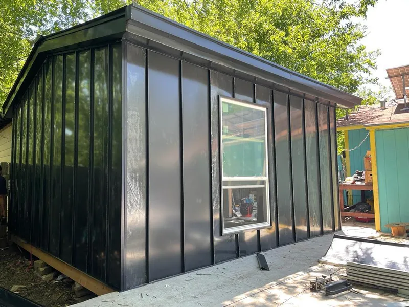 Black standing seam metal wall panels for Roof Inspection in Palatine