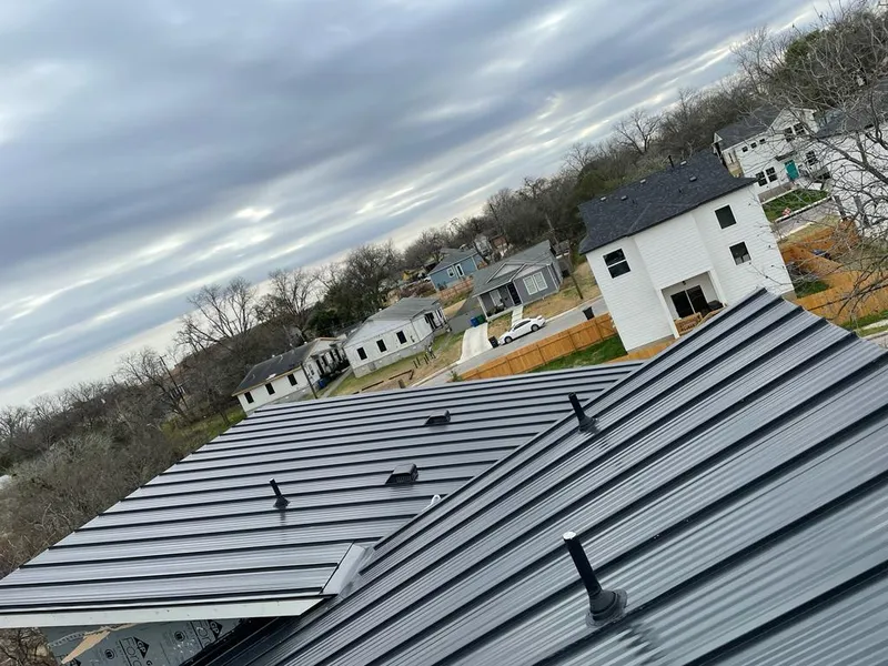 Standing seam metal roof panels with vents for Skylight Repair in Palatine